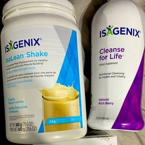 Lot of Isagenix Vanilla shake and bottle of Isacleanse